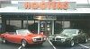 Two Firebirds Parked In Front Of Hooters